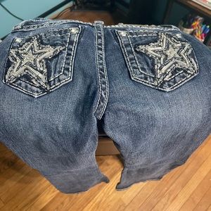 Girls size 10 boot Miss Me jeans with stars on back pockets.